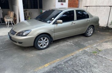 Selling Silver Mitsubishi Lancer 2010 in Quezon City