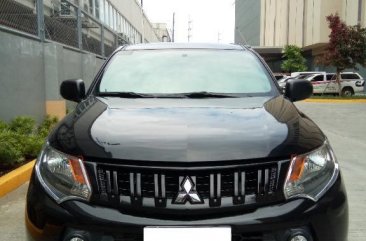 Selling Black Mitsubishi Strada 2017 in San Pedro