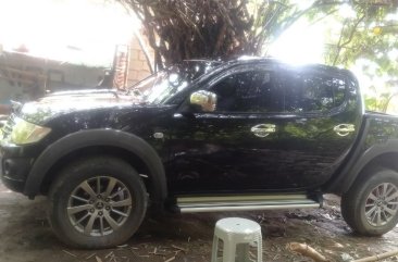 Selling Black Mitsubishi Strada 2010 in Manila