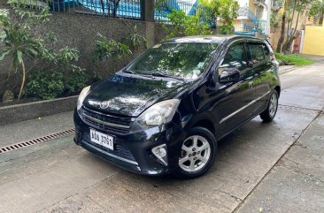 Selling Black Toyota Wigo 2015 in Quezon