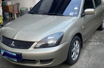 Selling Silver Mitsubishi Lancer 2010 in Quezon City