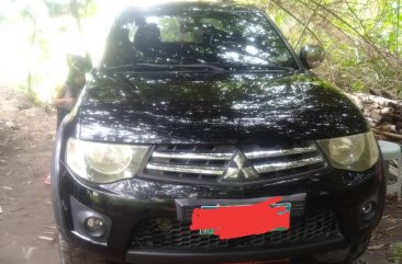 Selling Black Mitsubishi Strada 2010 in Manila