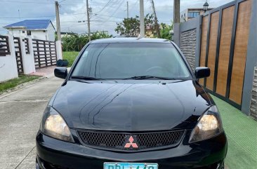 Selling Black Mitsubishi Lancer 2011 in Manila