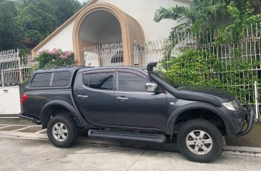 Sell Black 2013 Mitsubishi Strada in Manila