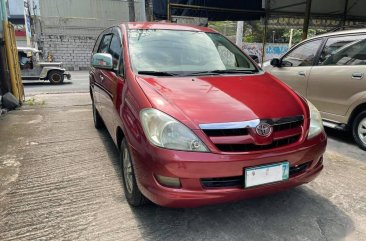 Red Toyota Innova 2006 for sale in Makati