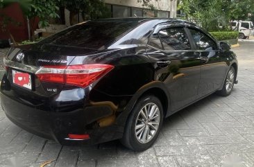 Selling Black Toyota Corolla Altis 2016 in Quezon