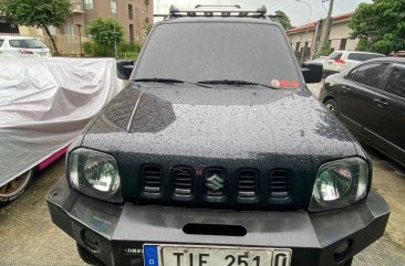 Sell Grey 2011 Suzuki Jimny in Masantol