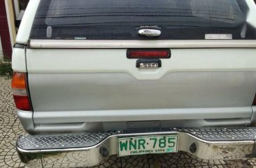 Pearl White Mitsubishi Strada 2000 for sale in Paranaque