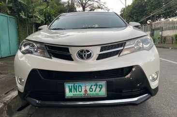 Selling White Toyota RAV4 2013 in Quezon