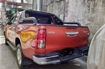 Selling Orange Toyota Hilux 2017 in Caloocan