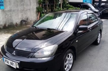 Selling Black Mitsubishi Lancer 2011 in Manila