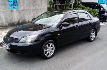 Selling Black Mitsubishi Lancer 2011 in Manila