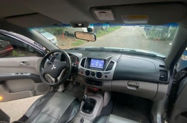 Brightsilver Mitsubishi Strada 2013 for sale in Quezon