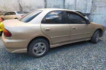 Pink Mazda 323 1996 for sale in San Juan