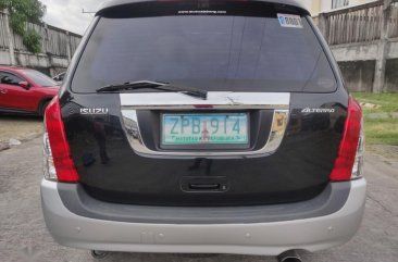 Selling Black Isuzu Alterra 2009 in Cainta