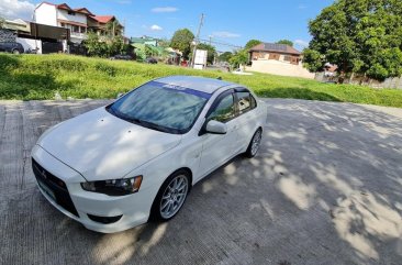 White Mitsubishi Lancer 2010 for sale in Muntinlupa 