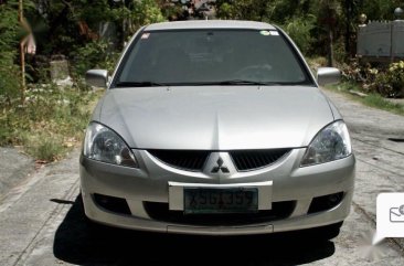 Selling Pearl White Mitsubishi Lancer 2004 in Imus