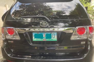 Selling Black Toyota Fortuner 2012 in Quezon City