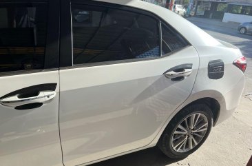 Pearl White Toyota Corolla Altis 2014 for sale in Calasiao