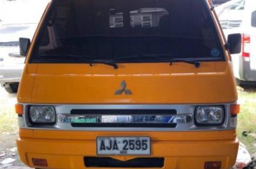 Yellow Mitsubishi L300 2015 for sale in Pasig