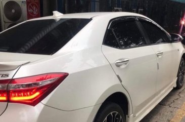 Selling Pearl White Toyota Corolla Altis 2015 in Bulacan