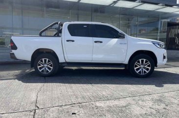 Pearl White Toyota Hilux 2019 for sale in Pasig