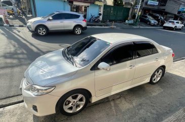 Selling Pearl White Toyota Corolla Altis 2013 in Pasay