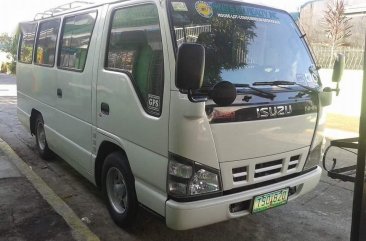 Selling White Isuzu NHR 2011 in Cavite