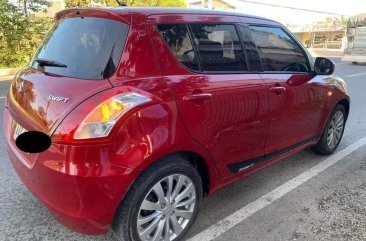 Red Suzuki Swift 2013 for sale in Lupao