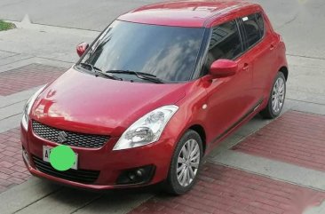 Red Suzuki Swift 2013 for sale in Lupao