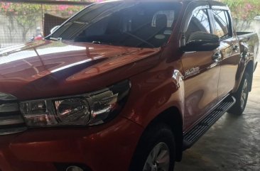 Selling Orange Toyota Hilux 2016 in Pasig