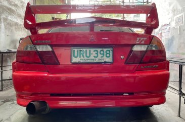 Selling Red Mitsubishi Lancer Evolution 1999 in Valenzuela