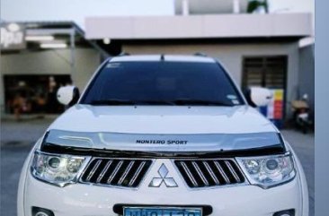 Pearl White Mitsubishi Montero sport 2013 for sale in Manila