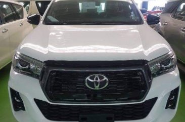 Selling White 2019 Toyota Hilux in Quezon City