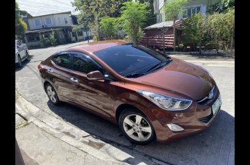 Selling Orange Hyundai Elantra 2014 in Kawit