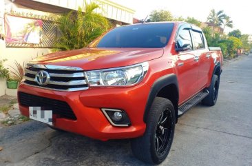 Orange Toyota Hilux 2017 for sale in Angeles 