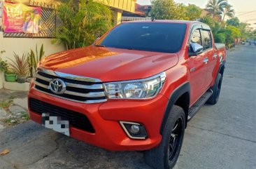 Orange Toyota Hilux 2017 for sale in Angeles 