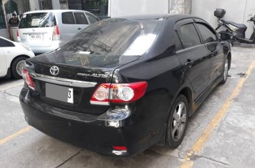 Selling Black Toyota Corolla Altis 2013 in Makati