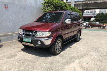 Red Isuzu Sportivo 2012 for sale in Quezon City
