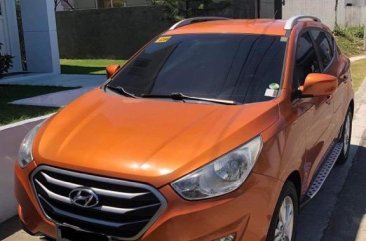 Selling Orange Hyundai Tucson 2013 in Biñan