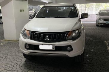 Sell White 2015 Mitsubishi Strada in San Juan