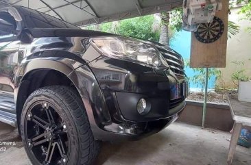 Selling Black Toyota Fortuner 2013 in Angono