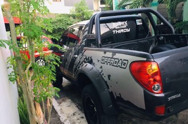 Selling Black Mitsubishi Strada 2009 in Manila