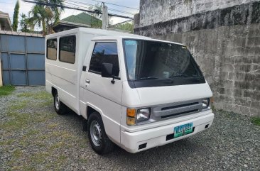 Selling White Mitsubishi L300 2014 in Quezon 