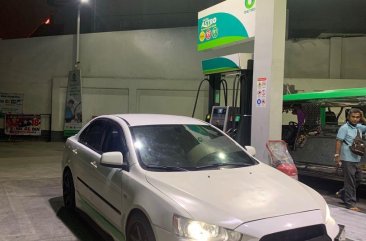 White Mitsubishi Lancer 2010 for sale in Quezon City