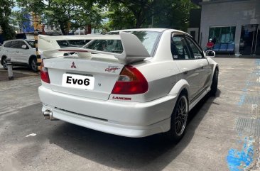 Selling Purple Mitsubishi Lancer 2022 in Quezon City