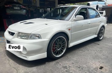 Selling Purple Mitsubishi Lancer 2022 in Quezon City