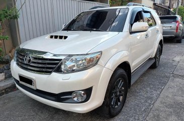 Pearl White Toyota Fortuner 2015 for sale in Quezon City