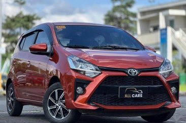 Selling Orange Toyota Wigo 2021 in Makati