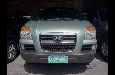 Yellow Hyundai Grand starex 2005 Van at  Manual   for sale in Quezon City